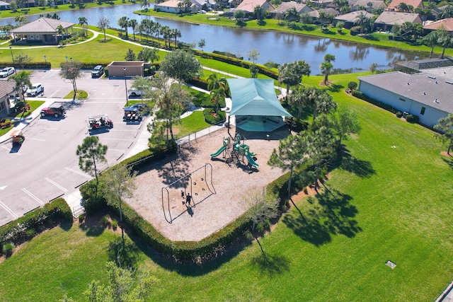 aerial view with a residential view and a water view