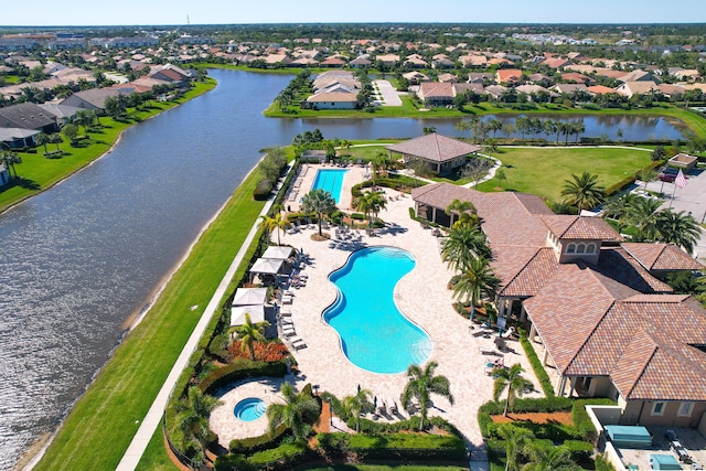 aerial view featuring a residential view and a water view