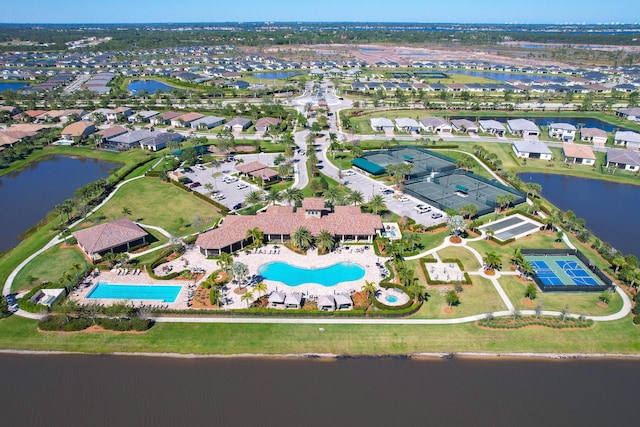 aerial view with a residential view and a water view