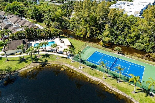 birds eye view of property featuring a water view