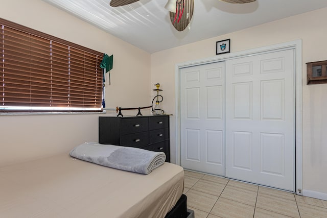 bedroom featuring a closet and ceiling fan