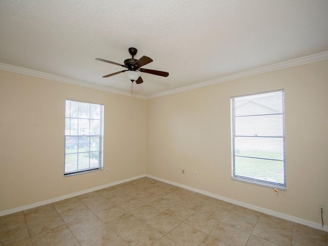 unfurnished room featuring crown molding, a ceiling fan, baseboards, and a textured ceiling