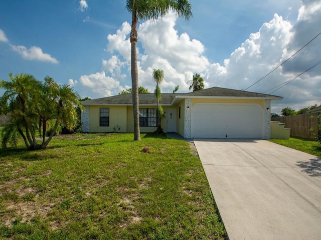 ranch-style home featuring fence, stucco siding, a front lawn, concrete driveway, and a garage