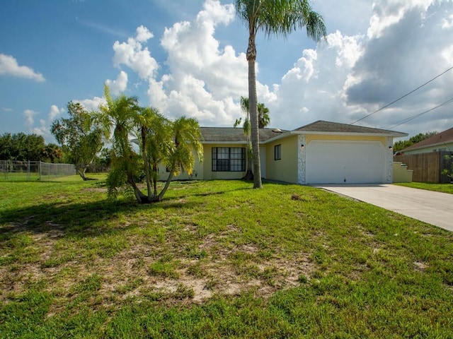 ranch-style house with stucco siding, a front lawn, driveway, fence, and a garage