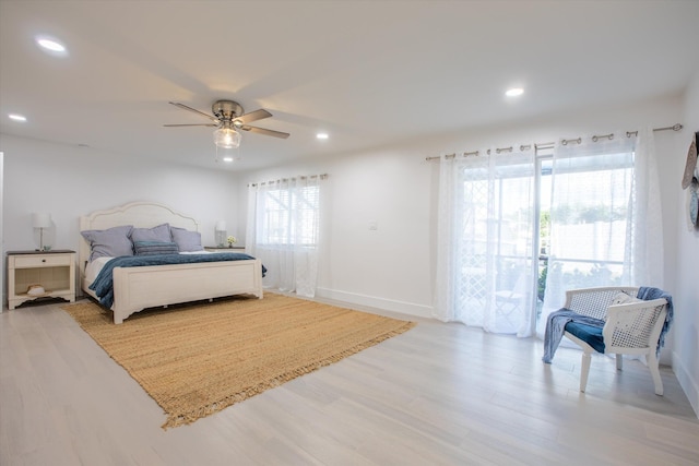 bedroom with a ceiling fan, recessed lighting, baseboards, and light wood finished floors