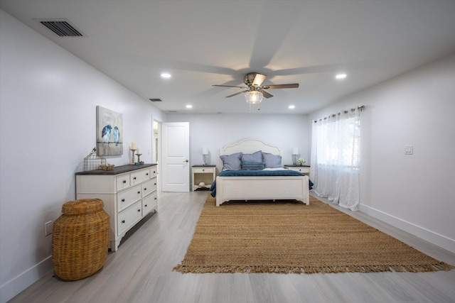 bedroom with recessed lighting, visible vents, baseboards, and light wood-style floors