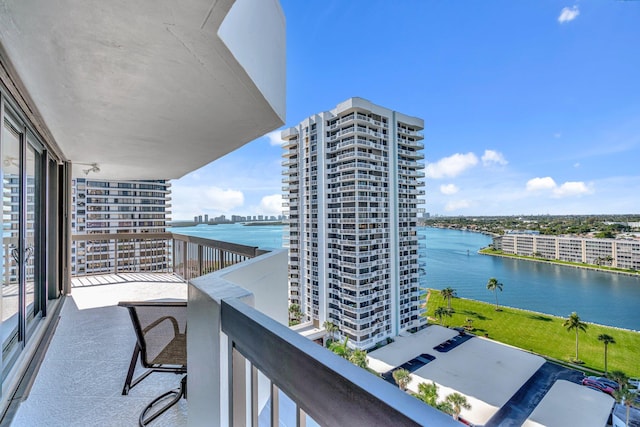 balcony with a city view and a water view