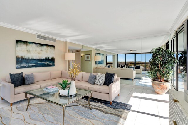 108 Lakeshore Dr Unit 1441, North Palm Beach, FL 33408 - living room featuring light tile patterned floors, crown molding, and a raised ceiling