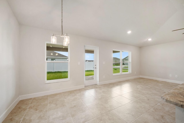 tiled spare room featuring recessed lighting, a ceiling fan, and baseboards