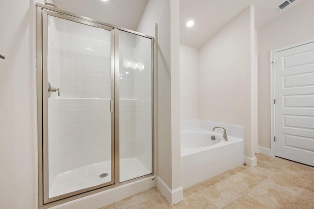 full bath featuring tile patterned floors, visible vents, a stall shower, and a garden tub