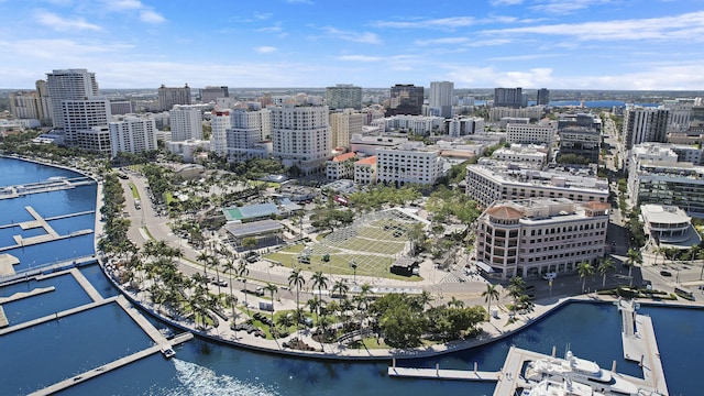 aerial view featuring a view of city and a water view