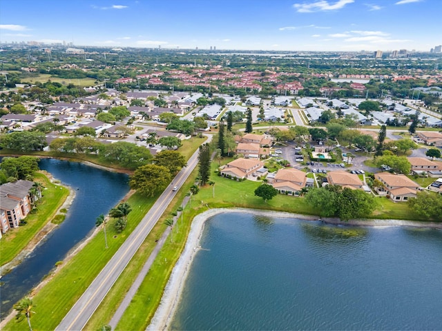 aerial view with a residential view and a water view