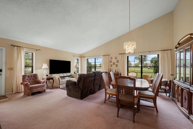 carpeted dining room with plenty of natural light, a textured ceiling, a chandelier, and high vaulted ceiling