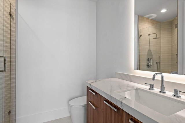 full bathroom with recessed lighting, a stall shower, toilet, and vanity