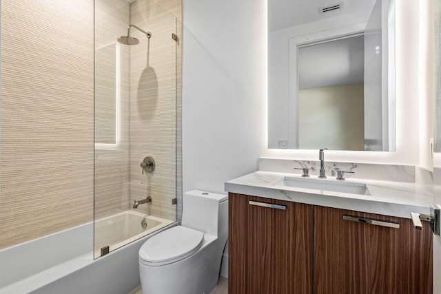 full bathroom featuring visible vents, toilet, shower / washtub combination, and vanity