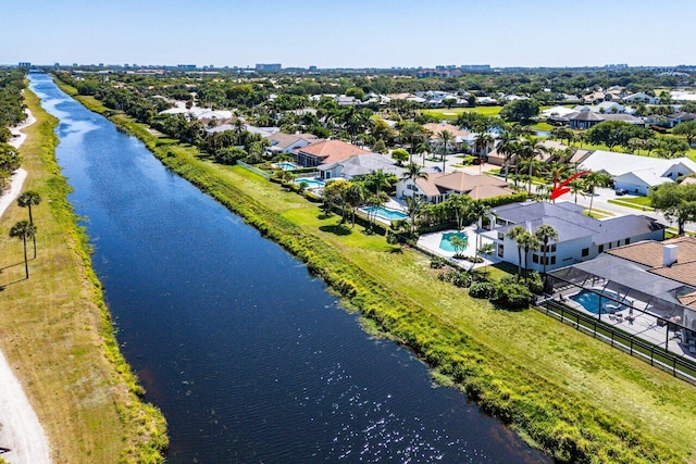 bird's eye view featuring a residential view and a water view