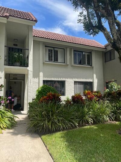 mediterranean / spanish home with stucco siding and a tile roof