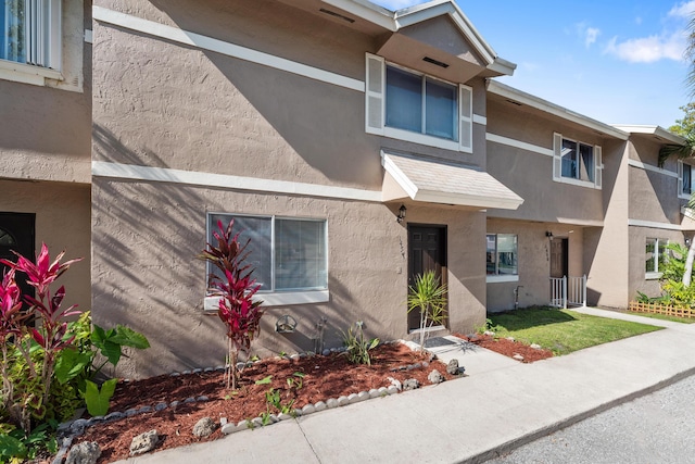 multi unit property with stucco siding