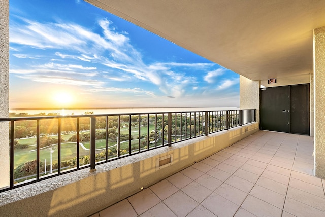 balcony at dusk with a water view