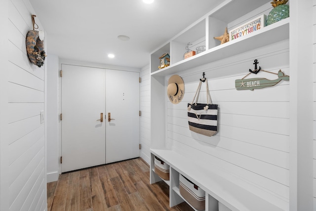 mudroom with recessed lighting and wood finished floors