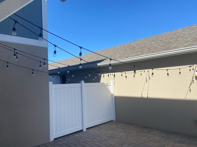 view of patio / terrace featuring fence