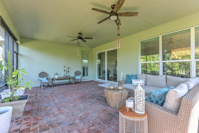 view of patio / terrace featuring an outdoor living space and ceiling fan