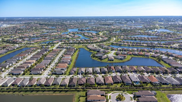 aerial view with a residential view and a water view