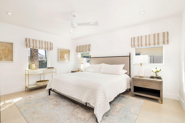 bedroom featuring ceiling fan and baseboards