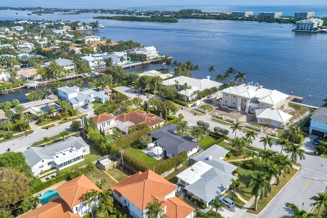 aerial view featuring a residential view and a water view