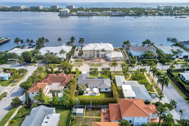 aerial view featuring a residential view and a water view