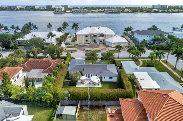 bird's eye view featuring a residential view and a water view