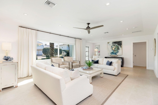 living room featuring light tile patterned floors, visible vents, recessed lighting, and ceiling fan