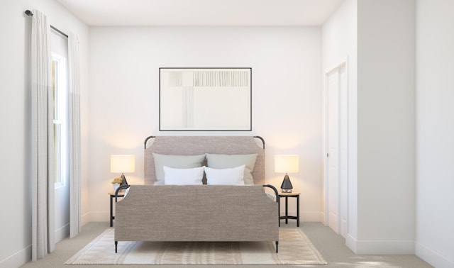 carpeted bedroom featuring baseboards