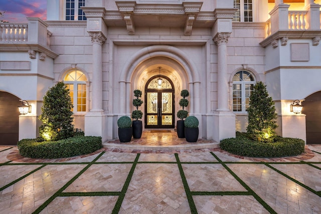 4216 Intracoastal Dr, Highland Beach, FL 33487 - property entrance featuring french doors and stone siding