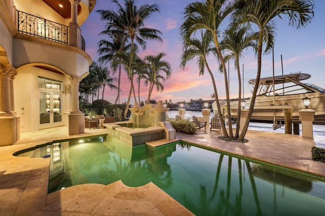 4216 Intracoastal Dr, Highland Beach, FL 33487 - outdoor pool featuring french doors and a patio