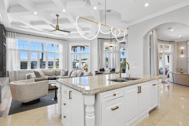 4216 Intracoastal Dr, Highland Beach, FL 33487 - kitchen featuring a sink, arched walkways, open floor plan, recessed lighting, and a ceiling fan