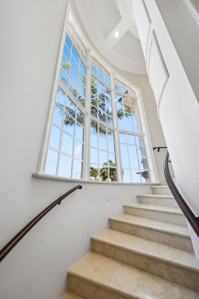 4216 Intracoastal Dr, Highland Beach, FL 33487 - stairway featuring healthy amount of natural light