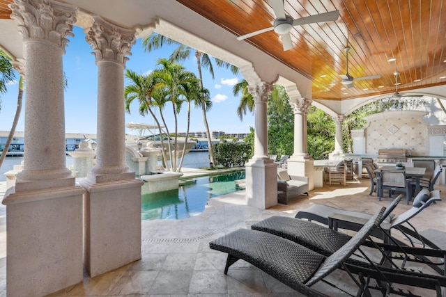 4216 Intracoastal Dr, Highland Beach, FL 33487 - view of patio / terrace with a ceiling fan, outdoor dining area, a water view, and an outdoor pool