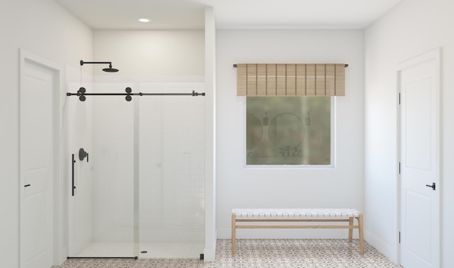 bathroom with recessed lighting and tiled shower