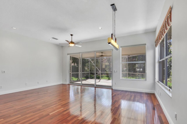 unfurnished room with ceiling fan, baseboards, wood finished floors, and recessed lighting