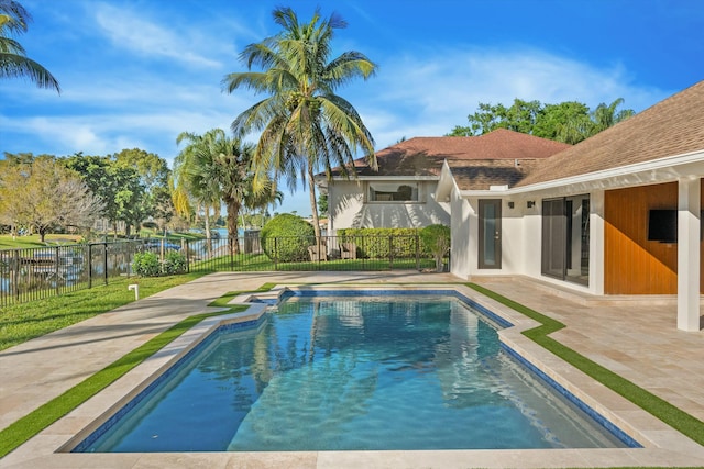 view of pool featuring a patio, a fenced backyard, and a fenced in pool