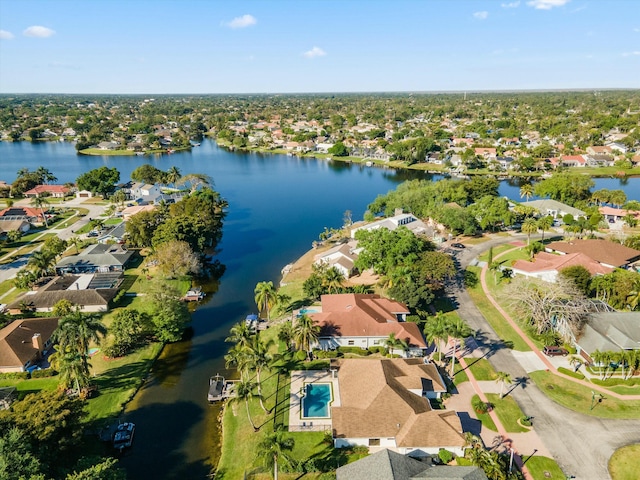 bird's eye view featuring a water view and a residential view