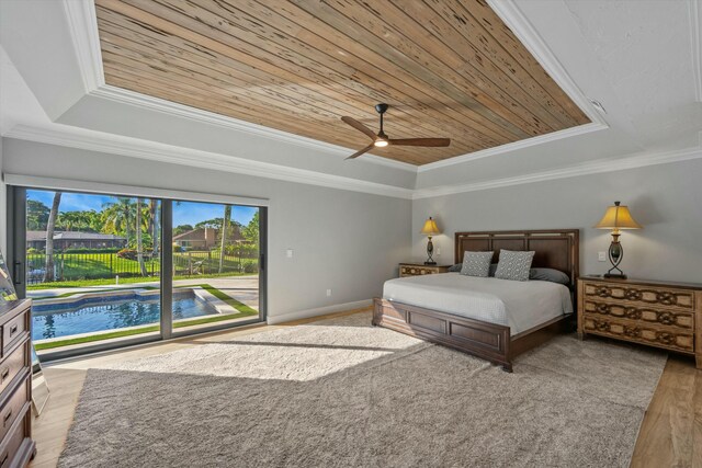 bedroom with access to exterior, a raised ceiling, wooden ceiling, and ornamental molding