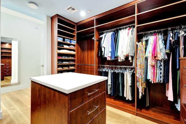 spacious closet with visible vents and light wood finished floors