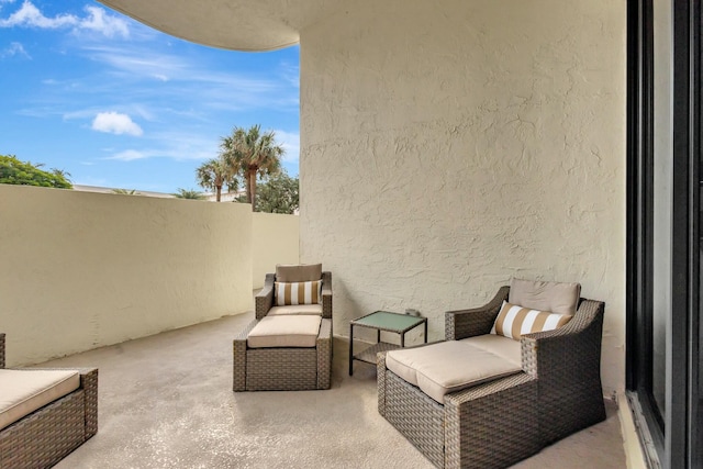 view of patio featuring fence