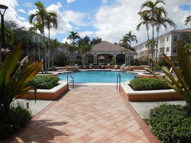 pool with a patio area