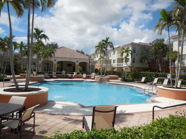 pool featuring a patio