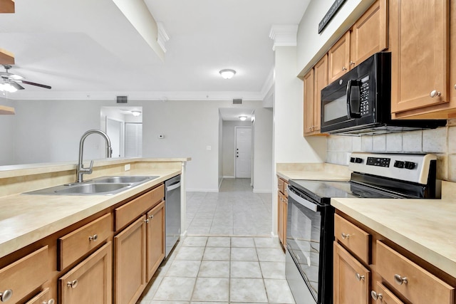 kitchen with backsplash, crown molding, light countertops, appliances with stainless steel finishes, and a sink