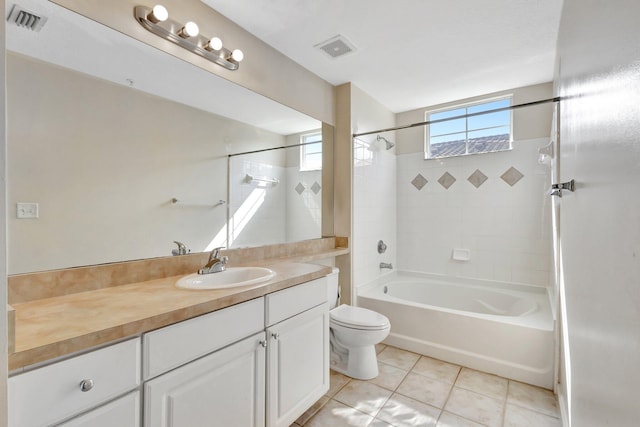 full bathroom featuring vanity, visible vents, tile patterned floors, toilet, and shower / bathtub combination