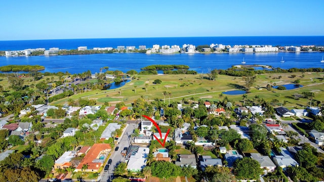 bird's eye view featuring golf course view and a water view